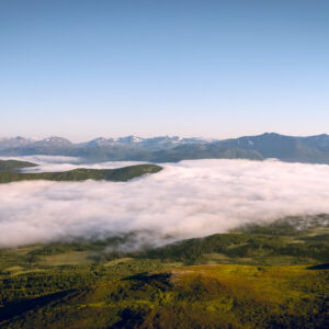 Cloud rolling across green highland at Storlitinden, Harstad